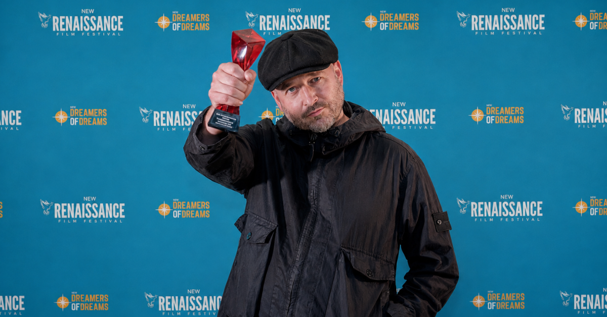 NRFF award winner raising his red trophy